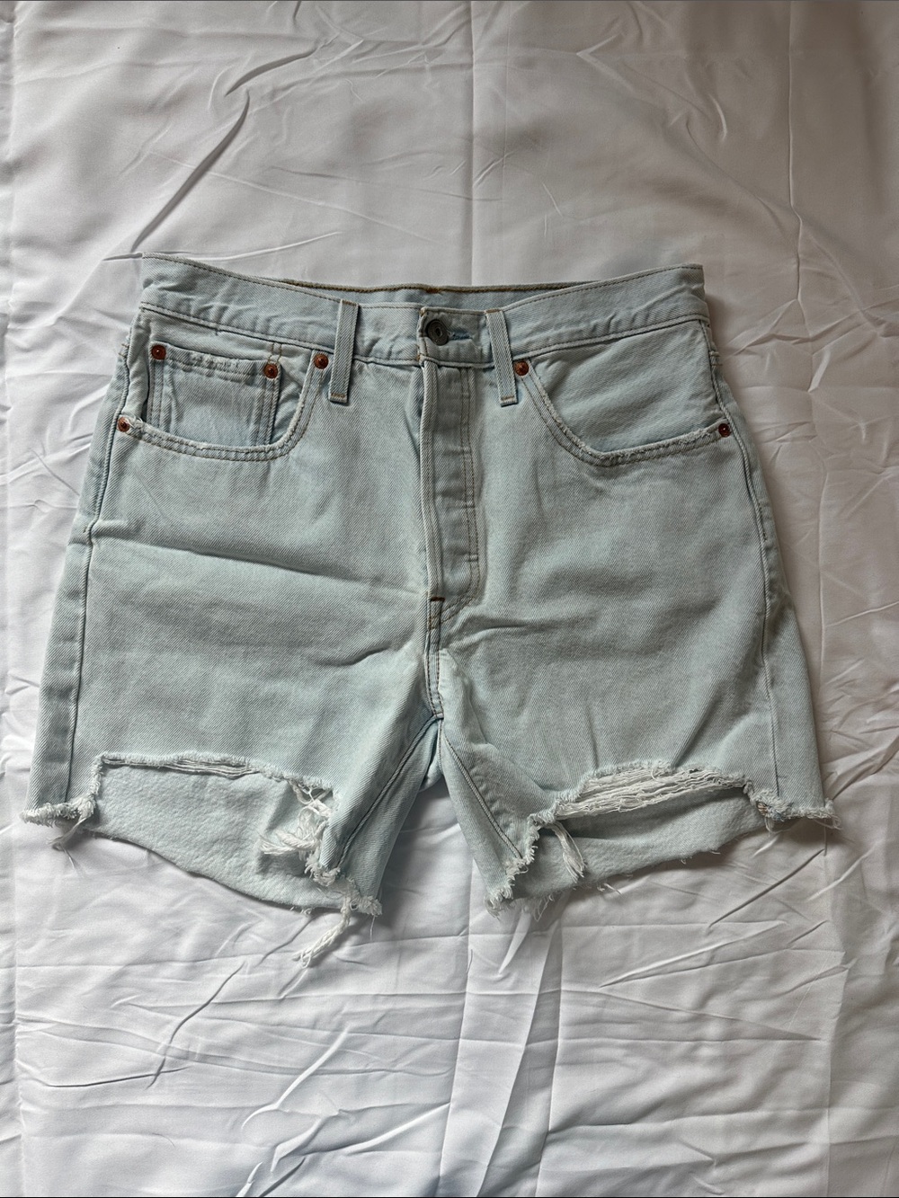 Levi's Faded Light Blue Distressed Denim Shorts